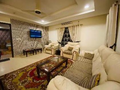 Retreat to stylish flat in bahria town - image 12