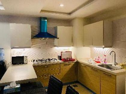 Retreat to stylish flat in bahria town - image 17