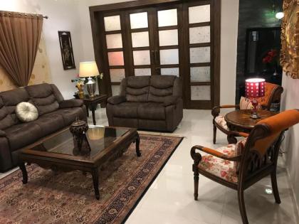 MJS Entire New Designer House 5 BR 13 bed 2 living reclining sofas Italian kitchen 6 bath garage side garden at prime location of Bahria Town Islamabad - image 12